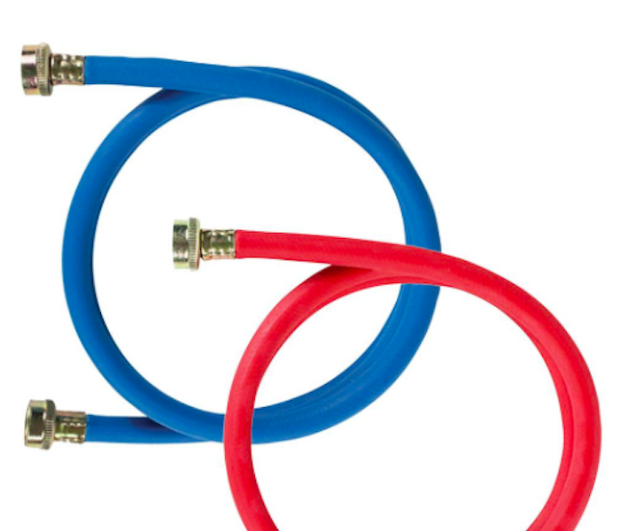 Two rolled water hoses one blue and one red